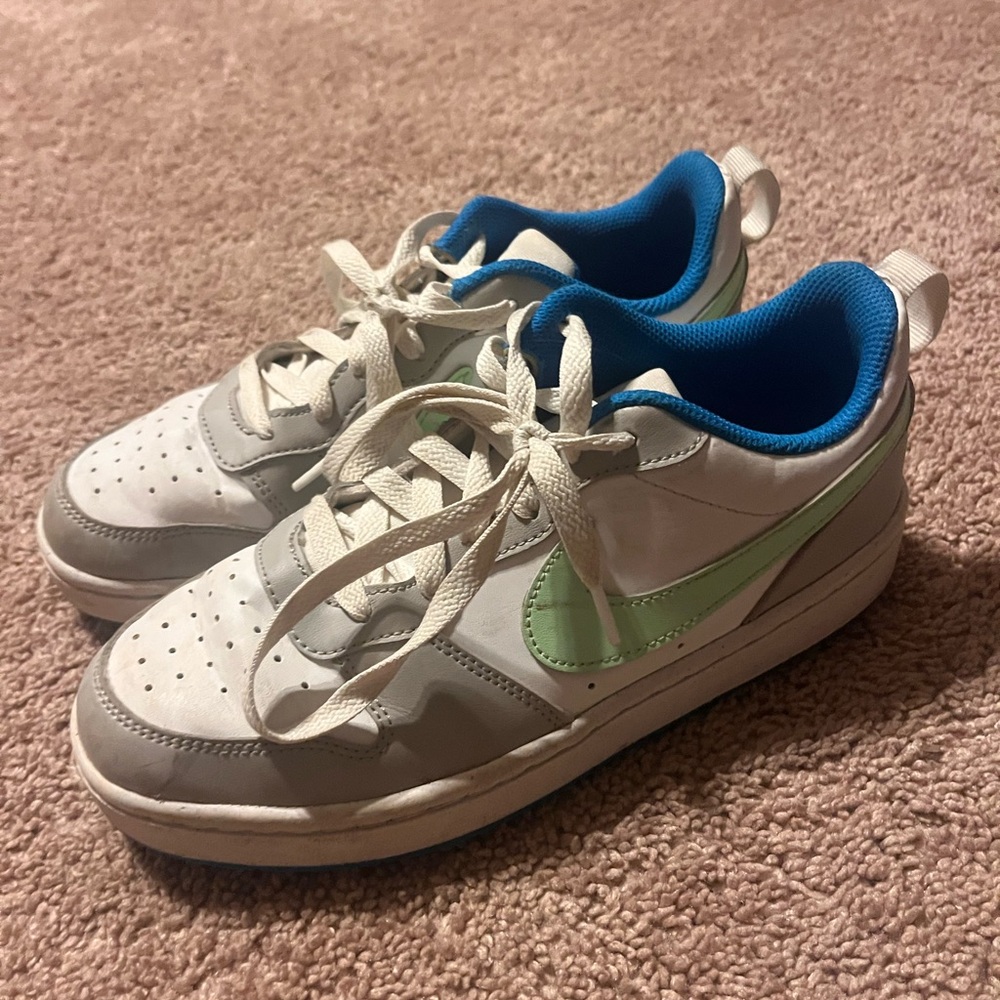 Nike Kids White Sneakers with Mint Swoosh and Blue Lining